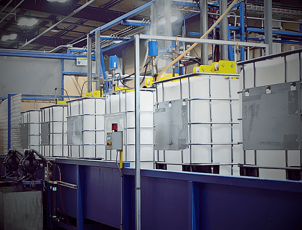 Washout system cleaning an IBC for the MPH United Wash & Return Program